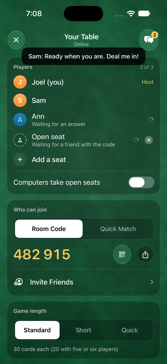 An online table with a six-digit room code, an invited friend, an open seat and a chat message.